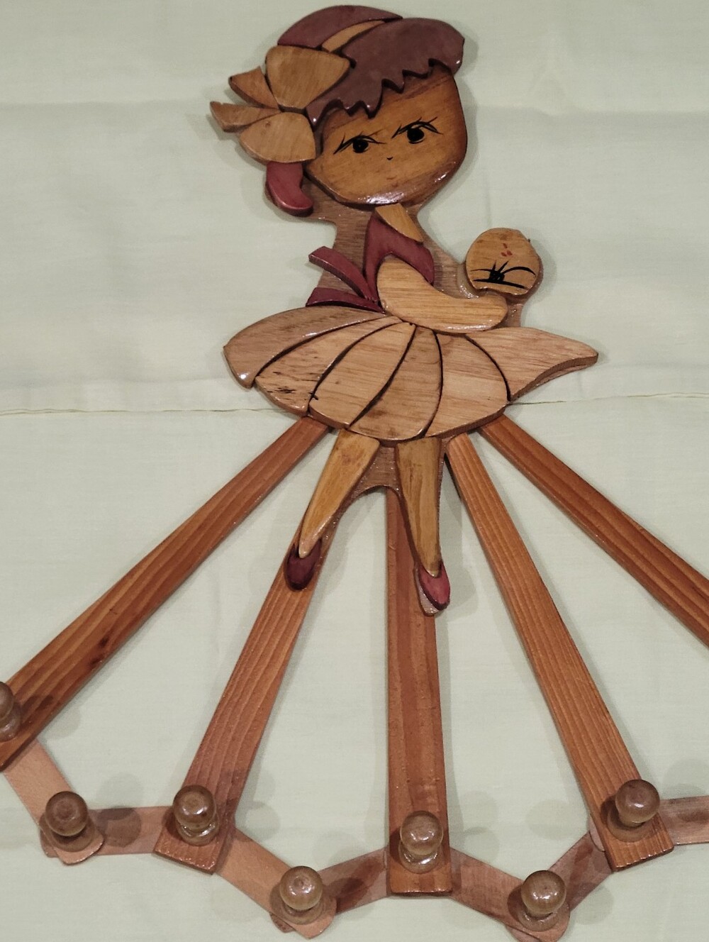 Vintage Wooded Accrodian Styke Coat Rack Featuring Hand Carved Girl Figurine